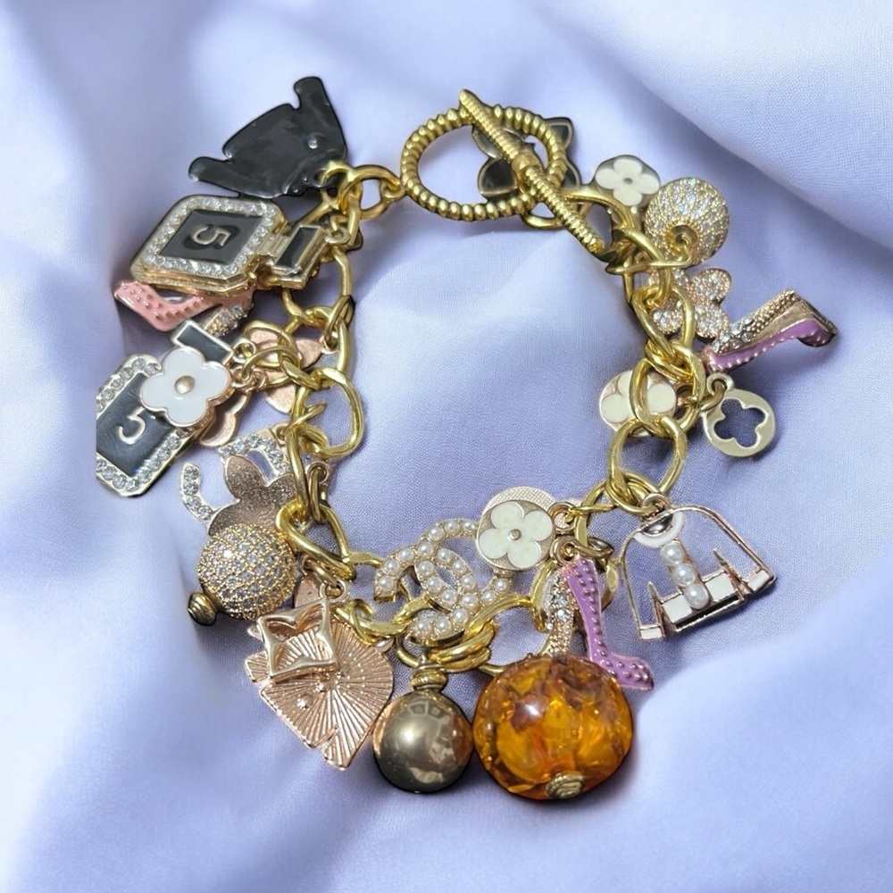Gold and Black Charm Bracelet - Picture 2 of 11